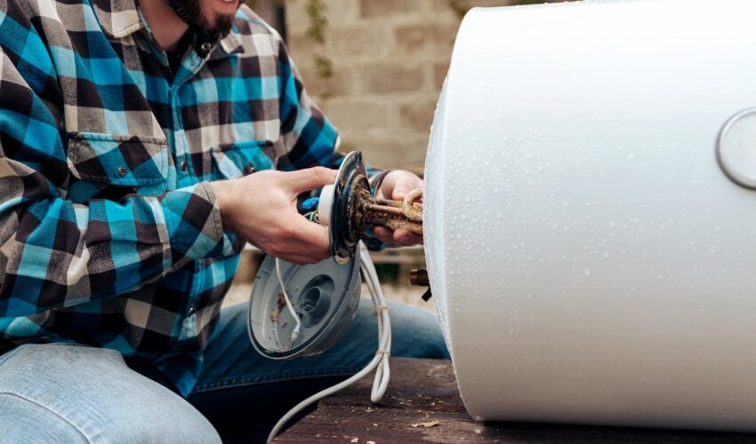 plumber servicing a boiler