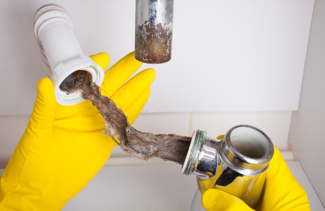 washbasins siphon cleaning in a bathroom