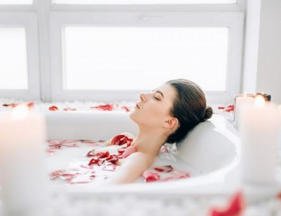 woman relaxing in bathtub