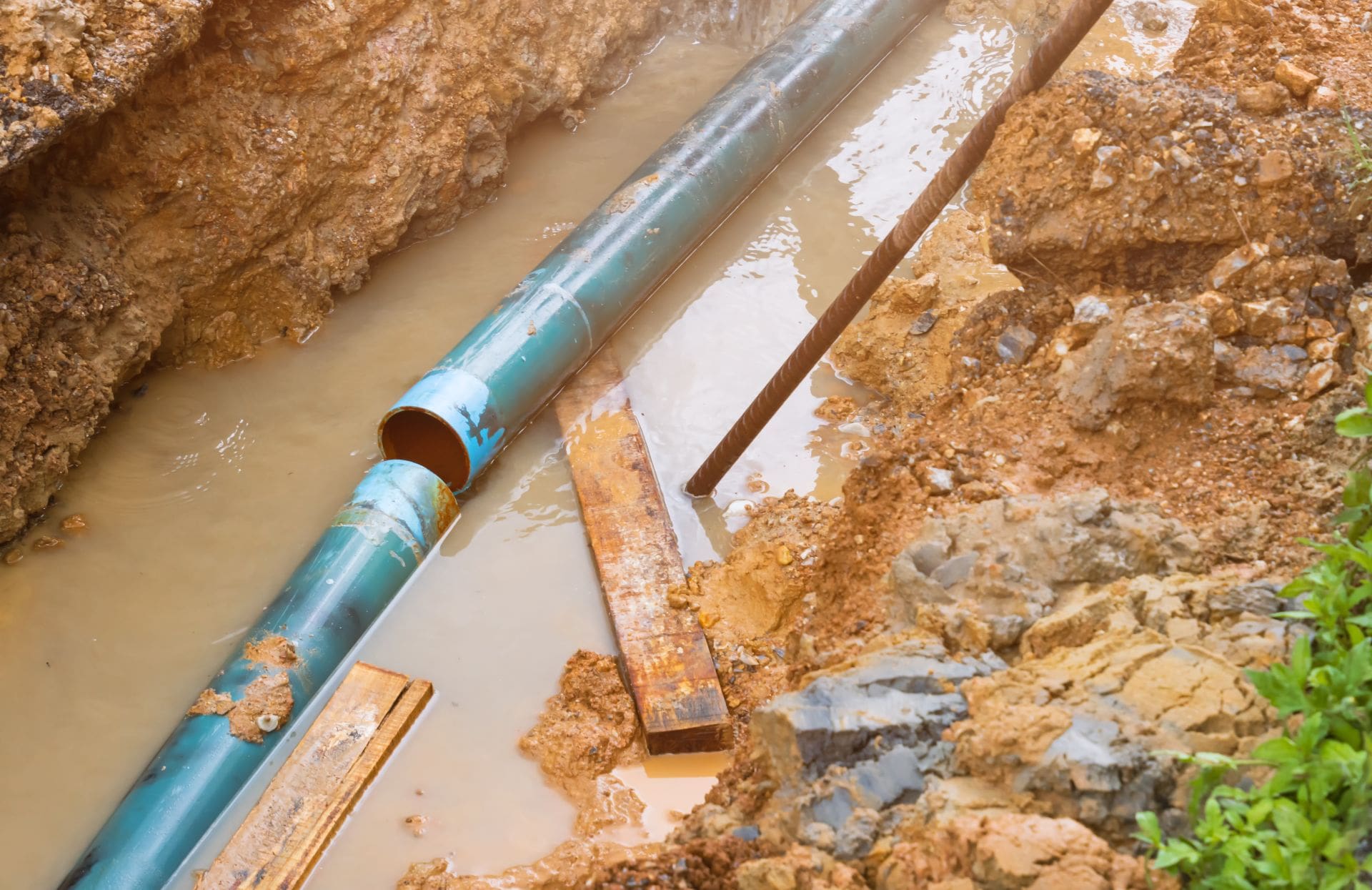 Repair the plumbing broken pipe and water flow in hole