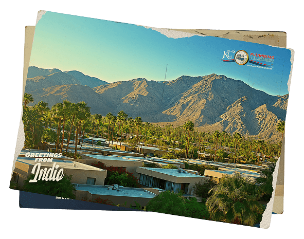 Scenic photo of Indio, CA homes nested in the valley below the mountains.